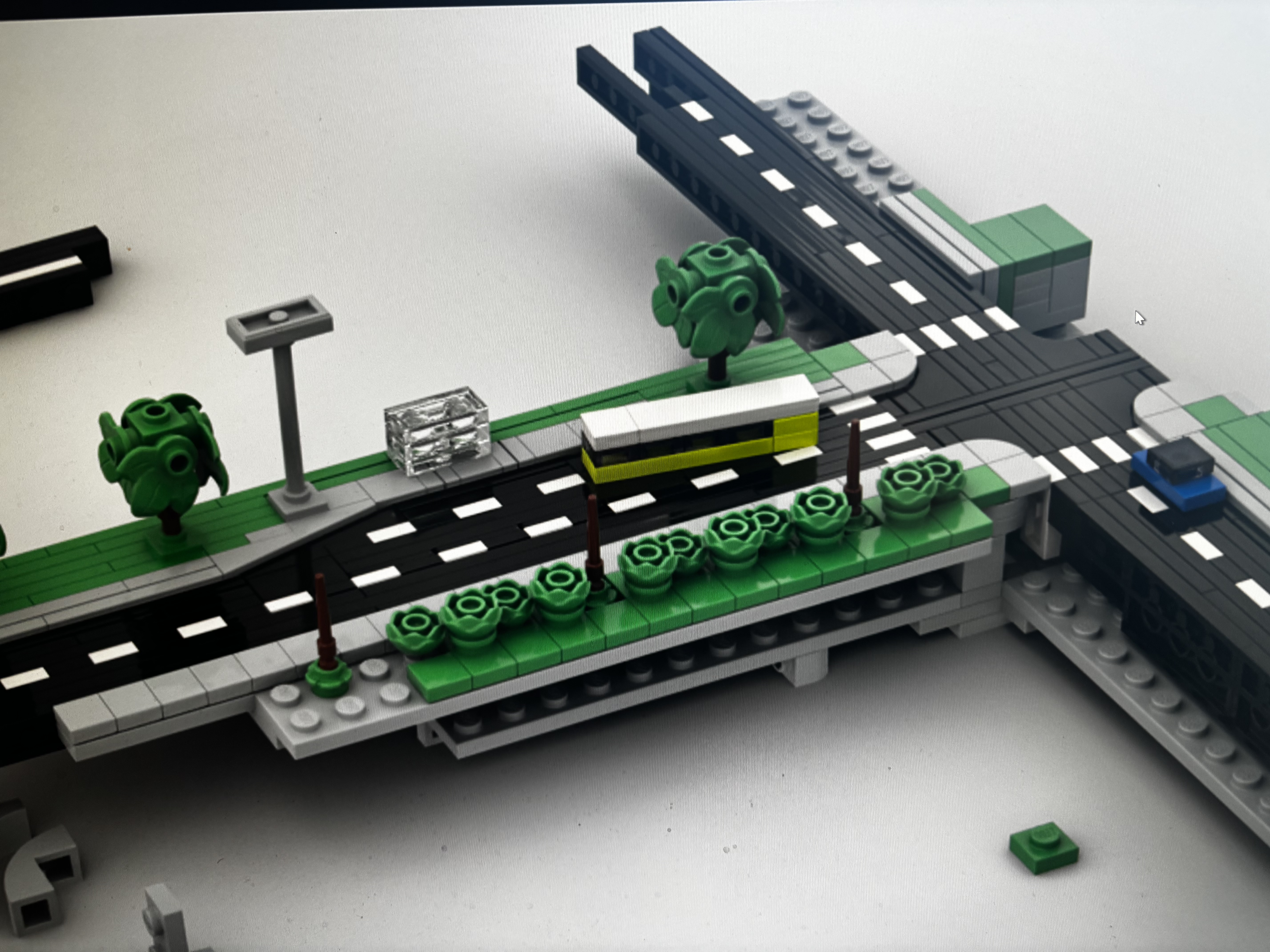 Physical road interchange detail with tram and pedestrian bridge